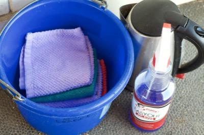 bucket and no rinse shampoo and washcloths for hot toweling